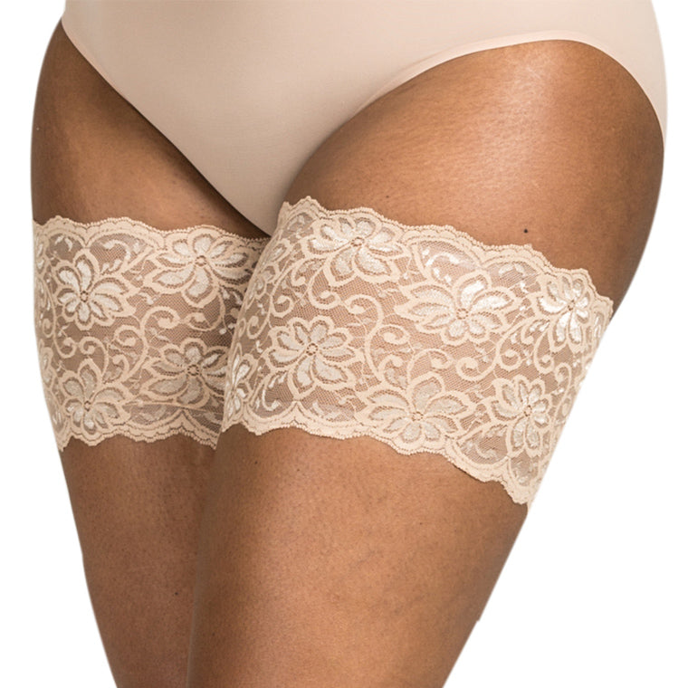 beige lace bandelettes thigh bands close up floral pattern side angle